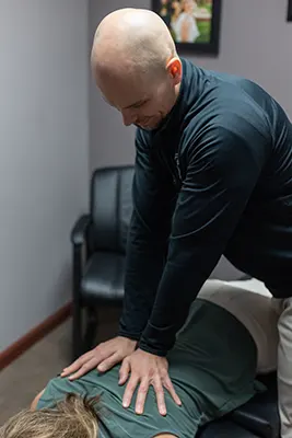 Chiropractor Jackson MI John Griswold Back Pain